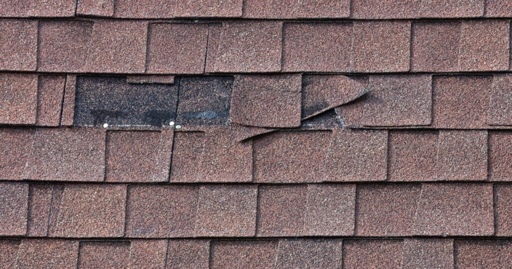 Missing roof shingles. 